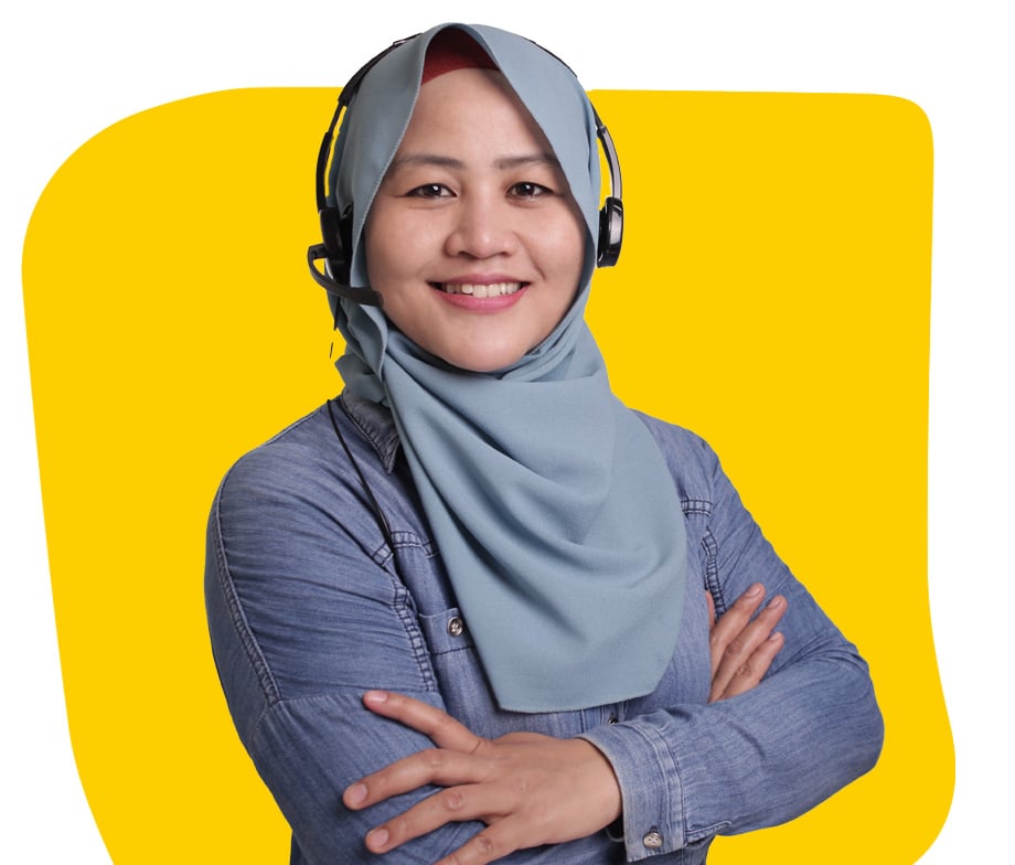 Dari Interpreter smiling wearing a headset and hijab