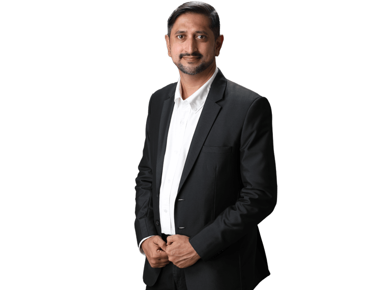 Hindi translation services, Portrait of handsome Indian business man smiling, standing on dark gray background